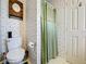 Bathroom with shower/tub combo and green shower curtain at 1026 Capella Dr, Tavares, FL 32778