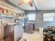 Laundry room with washer, dryer, and ample storage at 1026 Capella Dr, Tavares, FL 32778