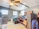 Workshop area with workbench, tools, and storage at 1026 Capella Dr, Tavares, FL 32778