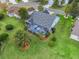 Aerial view showcasing home, backyard, and surrounding landscape at 1054 Soledad Way, The Villages, FL 32159