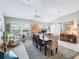 Elegant dining room with a large table and natural light at 1054 Soledad Way, The Villages, FL 32159