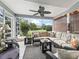 Relaxing screened porch with comfortable seating and outdoor views at 1054 Soledad Way, The Villages, FL 32159