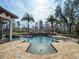 Inviting pool area with tranquil water features and beautifully hardscaped surroundings at 15118 Pendio Dr, Bella Collina, FL 34756