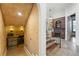 Unique wine cellar with temperature control; adjacent to entry and staircase at 15118 Pendio Dr, Bella Collina, FL 34756