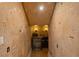 This wine cellar features textured walls and a granite countertop at 15118 Pendio Dr, Bella Collina, FL 34756