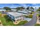 Waterfront manufactured home with a carport at 16 Captains Pt, Fruitland Park, FL 34731