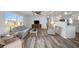 Spacious living room with hardwood floors and ample natural light at 16 Captains Pt, Fruitland Park, FL 34731