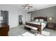 Spacious bedroom with a king-size bed and ample floor space at 16428 Good Hearth Blvd, Clermont, FL 34711