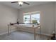Bedroom featuring a model train set on a large table at 16428 Good Hearth Blvd, Clermont, FL 34711