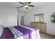 Bedroom with dresser and a ceiling fan at 16428 Good Hearth Blvd, Clermont, FL 34711