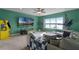 Bright bonus room with lake views, game system and home gym at 16428 Good Hearth Blvd, Clermont, FL 34711