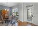 Entryway with a view into the dining area and hardwood floors at 16428 Good Hearth Blvd, Clermont, FL 34711