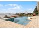 Inviting pool and spa with lake view and basketball hoop at 16428 Good Hearth Blvd, Clermont, FL 34711