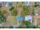 Aerial view of the home and surrounding neighborhood at 1660 1St St, Clermont, FL 34711