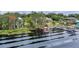 Waterfront property with private dock and lush landscaping at 1660 1St St, Clermont, FL 34711