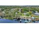 Aerial view showcasing waterfront property with boat dock at 1660 1St St, Clermont, FL 34711
