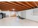Large unfinished basement with high ceilings and potential for future development at 1660 1St St, Clermont, FL 34711