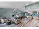 Open floor plan with a light and airy living area featuring comfortable seating at 1660 1St St, Clermont, FL 34711