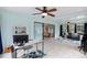 Spacious sunroom with access to living area, ideal for relaxation and work at 1660 1St St, Clermont, FL 34711