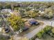 Aerial view of a charming house with a spacious backyard and detached garage at 2001 Sanford Ave, Sanford, FL 32771
