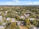 Aerial view showing a house nestled in a residential neighborhood near the water at 2001 Sanford Ave, Sanford, FL 32771