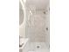 Modern bathroom with patterned tile shower and floating sink at 2001 Sanford Ave, Sanford, FL 32771