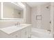 Updated bathroom with white vanity and patterned tile at 2001 Sanford Ave, Sanford, FL 32771