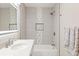 Modern bathroom with a walk-in shower and stone tile at 2001 Sanford Ave, Sanford, FL 32771