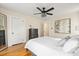 Bright bedroom with hardwood floors, and a large window at 2001 Sanford Ave, Sanford, FL 32771