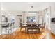 Bright dining room with hardwood floors and chandelier at 2001 Sanford Ave, Sanford, FL 32771