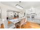 Open dining room with hardwood floors and chandelier at 2001 Sanford Ave, Sanford, FL 32771