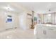 Bright entryway with white door and tile floors at 2001 Sanford Ave, Sanford, FL 32771