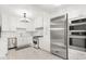 Modern kitchen with stainless steel appliances and white cabinets at 2001 Sanford Ave, Sanford, FL 32771