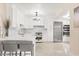 Modern white kitchen featuring stainless steel appliances at 2001 Sanford Ave, Sanford, FL 32771