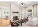 Spacious living room featuring a fireplace and hardwood floors at 2001 Sanford Ave, Sanford, FL 32771