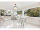 Bright office space with glass desk and large windows at 2001 Sanford Ave, Sanford, FL 32771