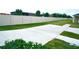 Large backyard with a concrete patio and a tall privacy fence at 2295 Delhi Pl, Sanford, FL 32771