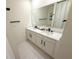 Modern bathroom with double vanity and black matte fixtures at 2295 Delhi Pl, Sanford, FL 32771