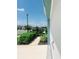 Landscaped front yard featuring lush greenery and a well-maintained walkway leading to the entrance at 2295 Delhi Pl, Sanford, FL 32771