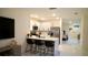 Modern kitchen with white cabinets, quartz countertops, and stainless steel appliances at 2295 Delhi Pl, Sanford, FL 32771