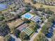 Aerial view of community amenities including pool, tennis, and pickleball courts at 25141 Clifford Hl, Leesburg, FL 34748