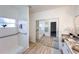 Clean bathroom with walk-in shower, granite countertop and updated fixtures at 25141 Clifford Hl, Leesburg, FL 34748