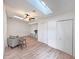 Spacious bonus room with skylights and ceiling fan at 25141 Clifford Hl, Leesburg, FL 34748