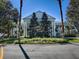 Elegant community clubhouse with columns and landscaping at 25141 Clifford Hl, Leesburg, FL 34748
