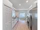 Updated kitchen with stainless steel appliances and light wood flooring at 25141 Clifford Hl, Leesburg, FL 34748