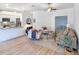Open and airy living room with light flooring and comfortable seating at 25141 Clifford Hl, Leesburg, FL 34748