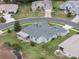 Single-Gathering home with covered patio, large backyard, and neighborhood view at 27504 Stoney Brook Dr, Leesburg, FL 34748