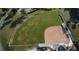 Community baseball field with dugouts and spectator areas at 27504 Stoney Brook Dr, Leesburg, FL 34748