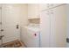 Convenient laundry room with washer, dryer and storage at 27504 Stoney Brook Dr, Leesburg, FL 34748