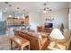Comfortable living room with leather furniture and fireplace at 27504 Stoney Brook Dr, Leesburg, FL 34748